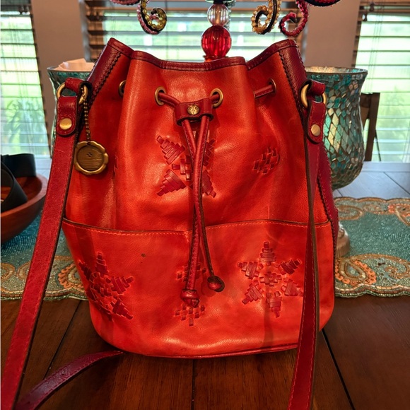 Handbags - Patricia Nash Red Leather Cinch Bag with Embossed Design